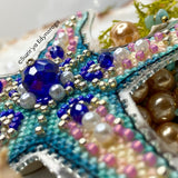 Cross Stitch kit Starfish, threads, beads and decorative crystals.