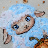 Vivi with a pumpkin Cross Stitch Kit sampler: Tela Artis, Hand-Dyed Threads, Linen